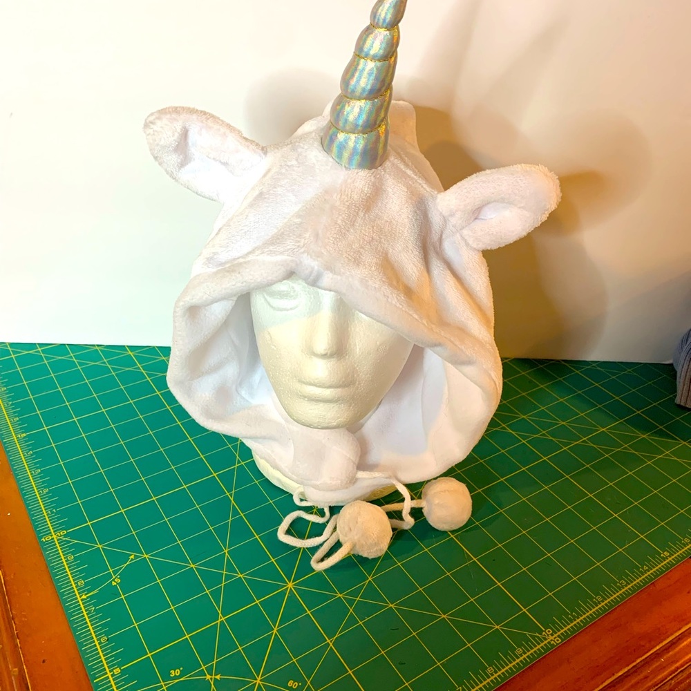 Unicorn Hat with pompom toes.